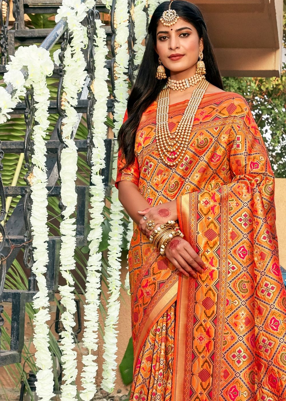 Tangerine Orange Woven Patola Silk Saree: Top Pick