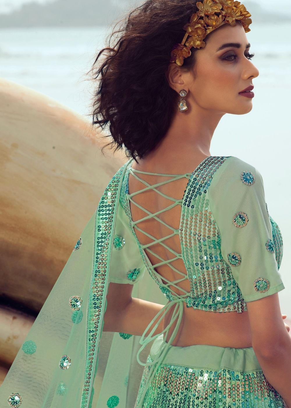 Mint Green Soft Net Designer Lehenga Choli with overall Sequins work