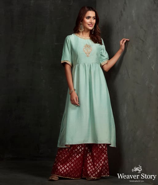 Hand front boota embroidered munga silk suit in light blue color with brocade palazzo
