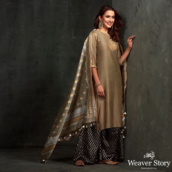 Hand embroidered munga silk suit in olive green color with brocade palazzo