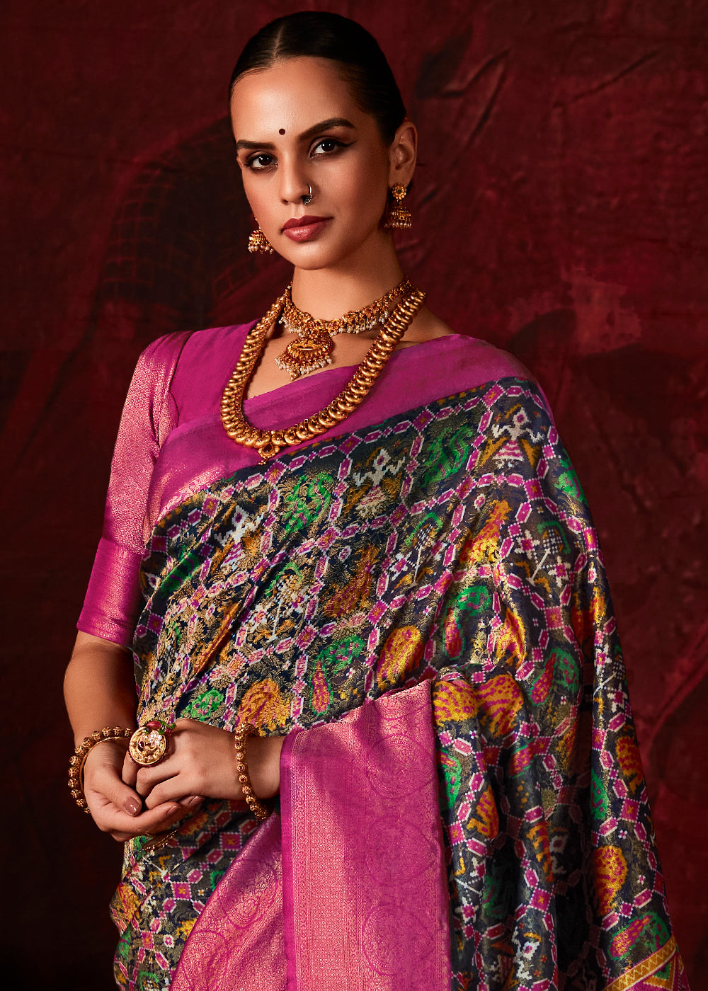 Shades Of Pink Patola Printed Silk Saree with Contrast Blouse