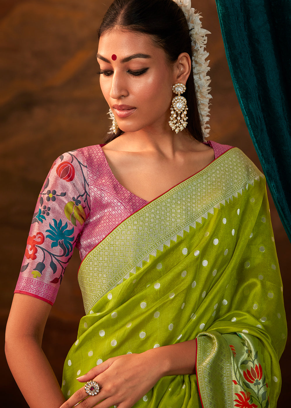 Beautiful Green Paithani Banarasi Silk Saree having Resham Woven Floral Motifs