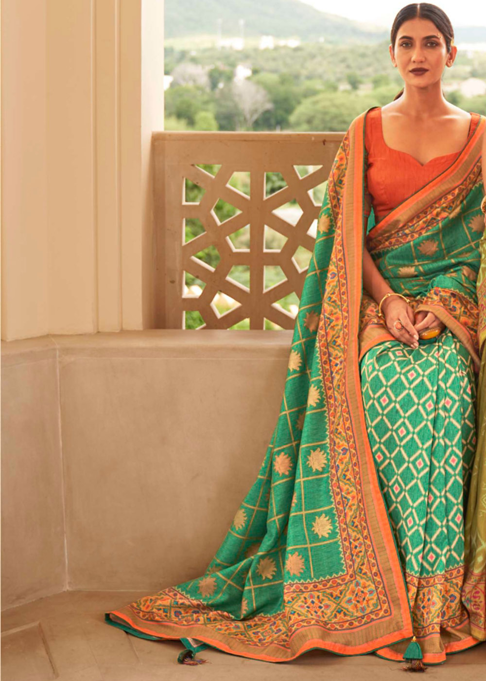 Jungle Green Patola Print Georgette Silk Saree