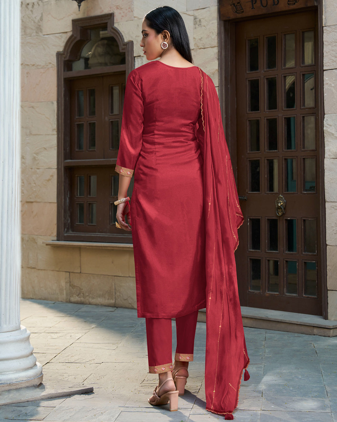 Scarlet Red Rose Dola Silk Kurta . Paired with Santoon Straight Pants and Organza Dupatta