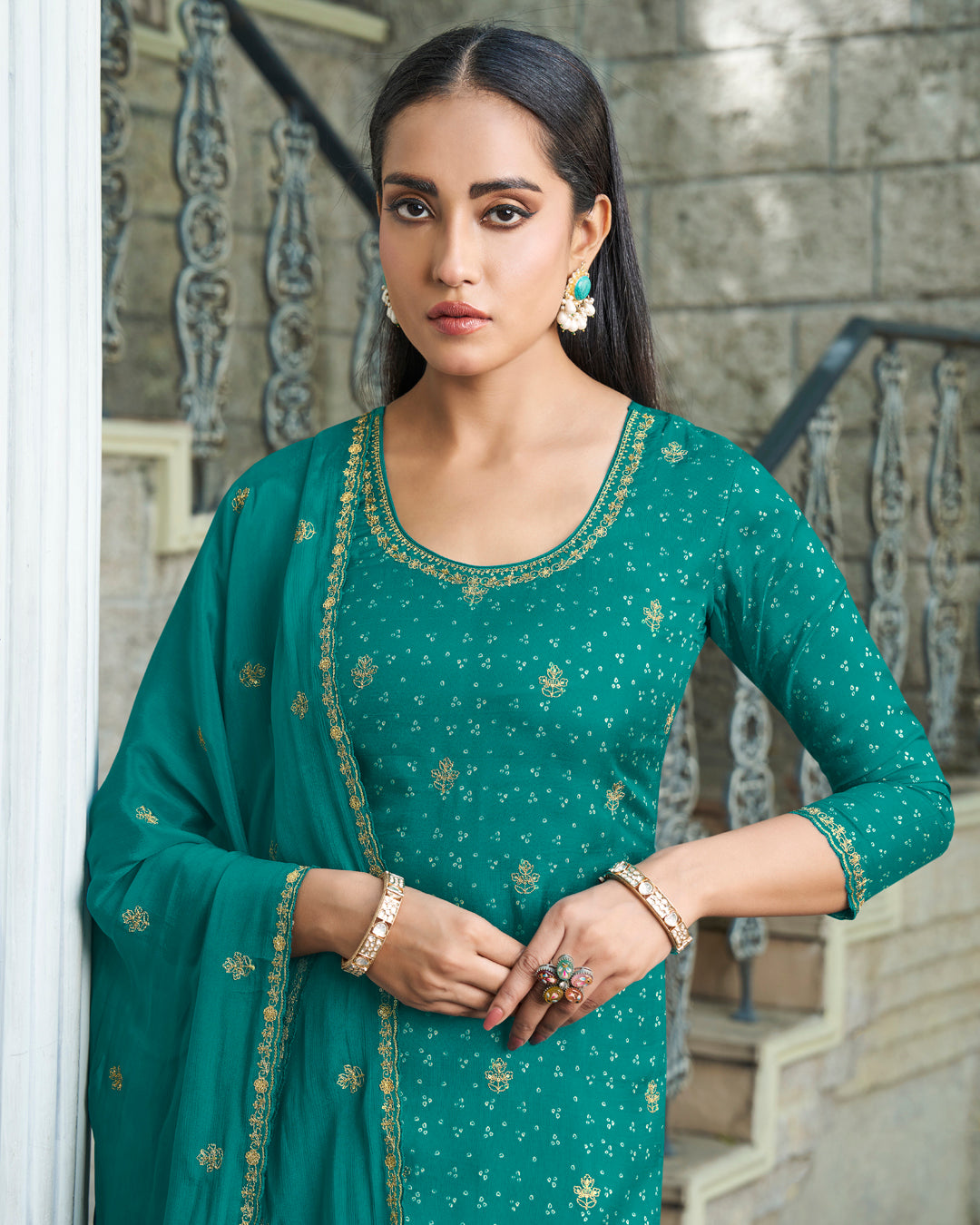 Sea Green Dola Silk Kurta with Bandhni Print & Zari Work. Paired with Santoon Straight Pants and Chinon Dupatta