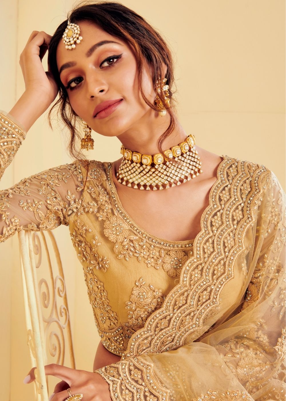 Antique Golden Soft Net Lehenga Choli with Cording Embroidery & Stone work