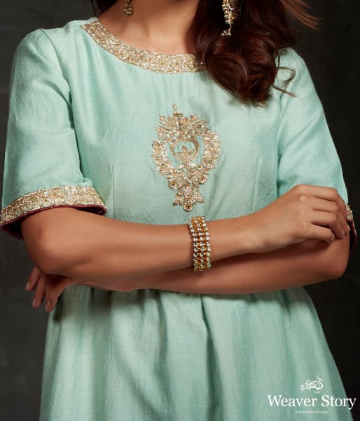 Hand front boota embroidered munga silk suit in light blue color with brocade palazzo
