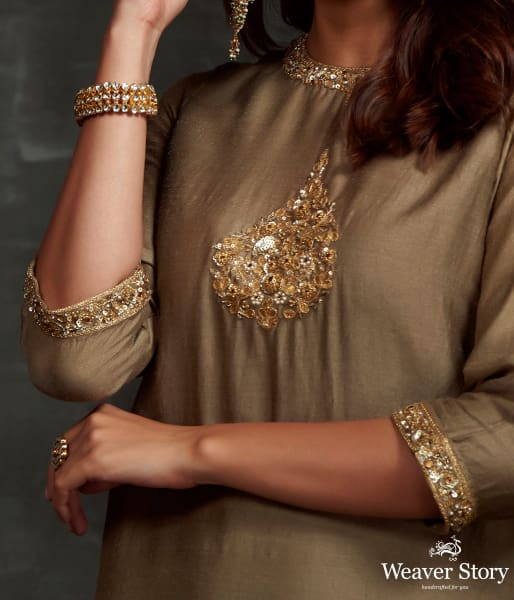 Hand embroidered munga silk suit in olive green color with brocade palazzo