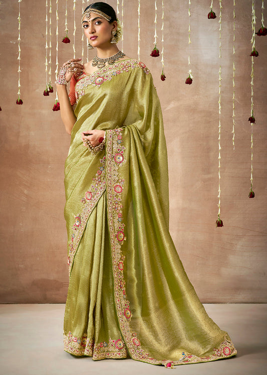 Pistachio Green Zari Woven Tissue Dola Silk Saree having Sequence, Pearl, Mirror & Thread Work: Festival Edition