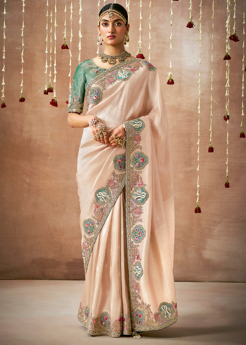 Pale Peach Pink Zari Woven Tissue Dola Silk Saree having Sequence, Pearl, Mirror & Thread Work: Festival Edition