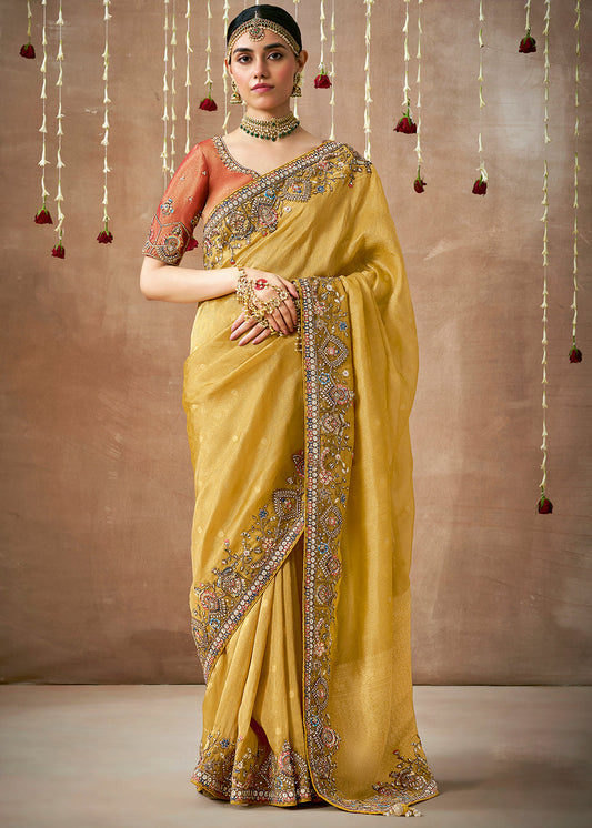 Mustard Yellow Zari Woven Tissue Dola Silk Saree having Sequence, Pearl, Mirror & Thread Work: Festival Edition