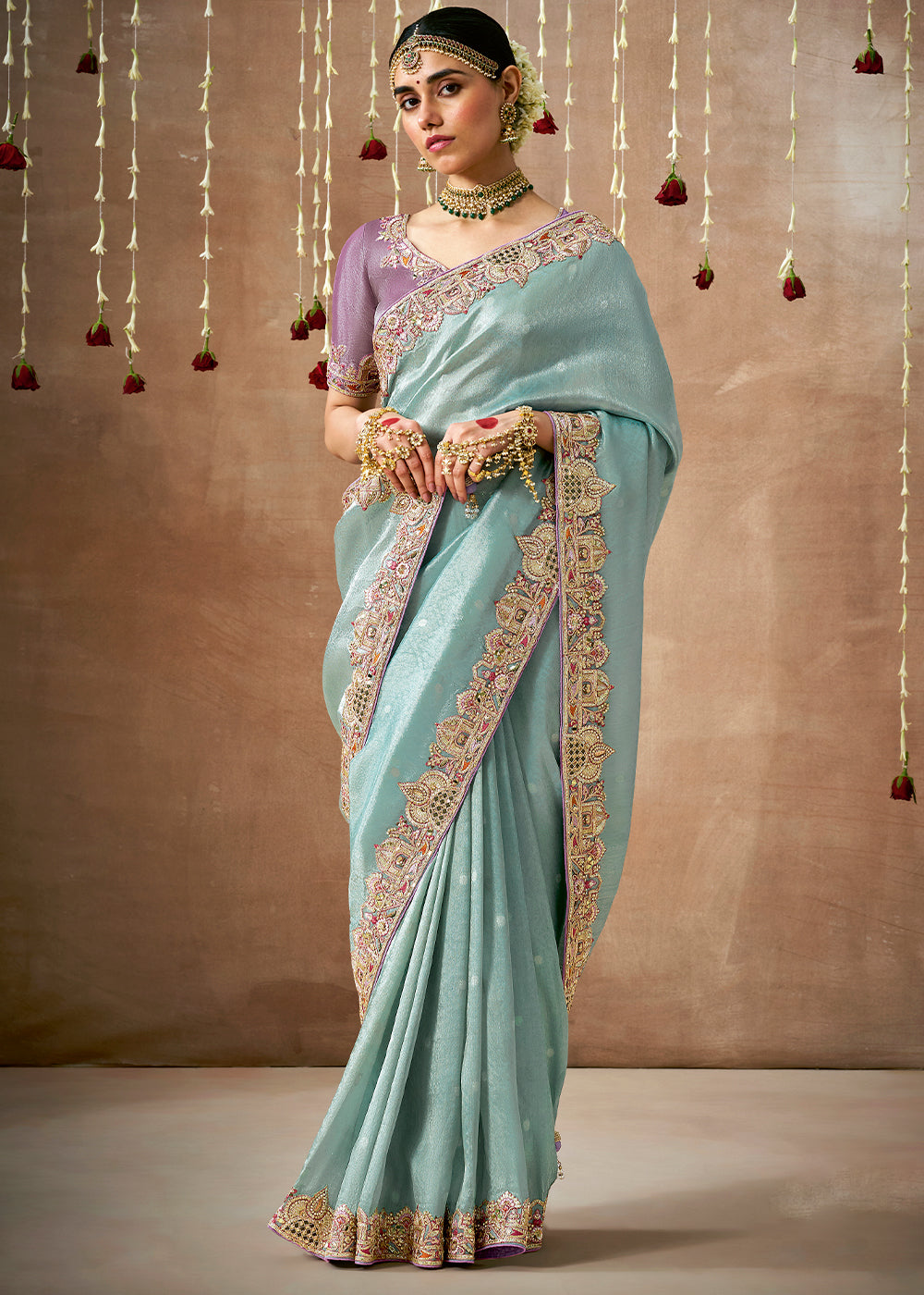 Light Blue Zari Woven Tissue Dola Silk Saree having Sequence, Pearl, Mirror & Thread Work: Festival Edition