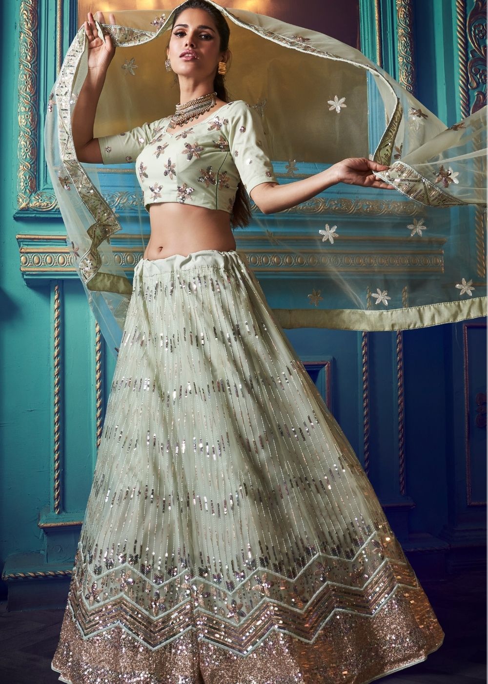 Pistachio Green Designer Soft Net Lehenga Choli with Sequin and Thread work