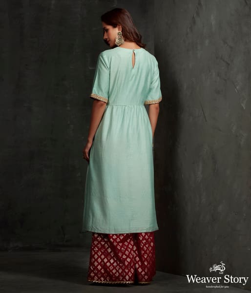 Hand front boota embroidered munga silk suit in light blue color with brocade palazzo