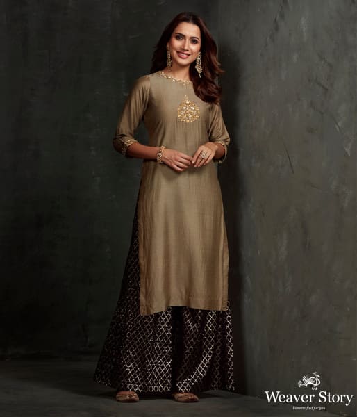 Hand embroidered munga silk suit in olive green color with brocade palazzo