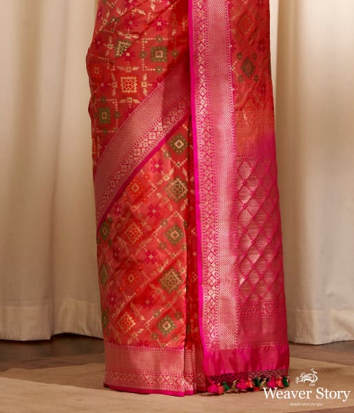 Handwoven Orange Banarasi Patola Saree with Pink Border