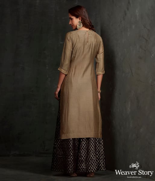 Hand embroidered munga silk suit in olive green color with brocade palazzo