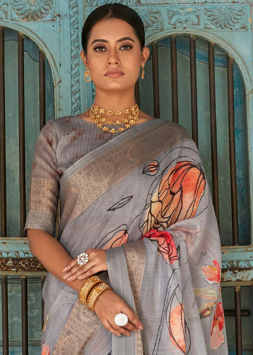 Shades Of Grey Floral Printed linen Saree with Zari Border