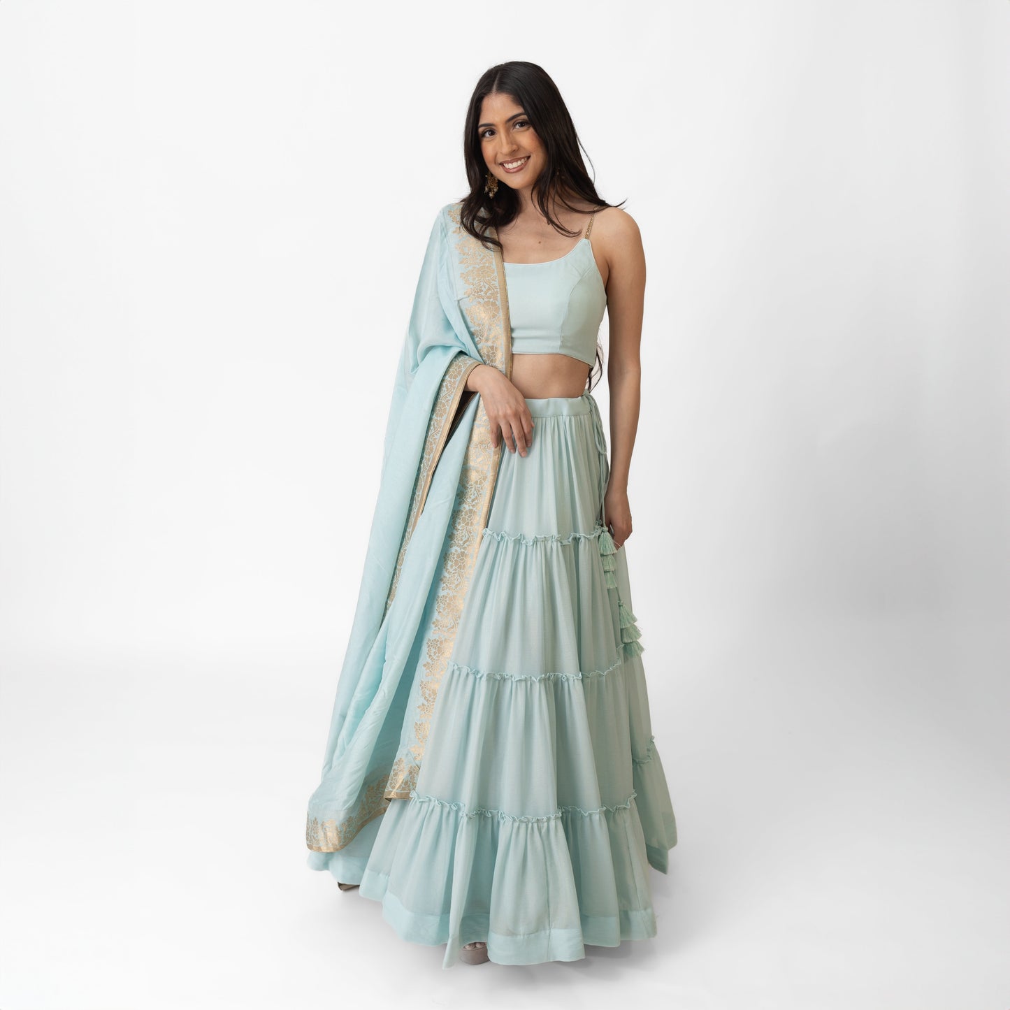 Elvia Sky Blue Shimmer Tiered Lehenga Choli Set with Gold Accents