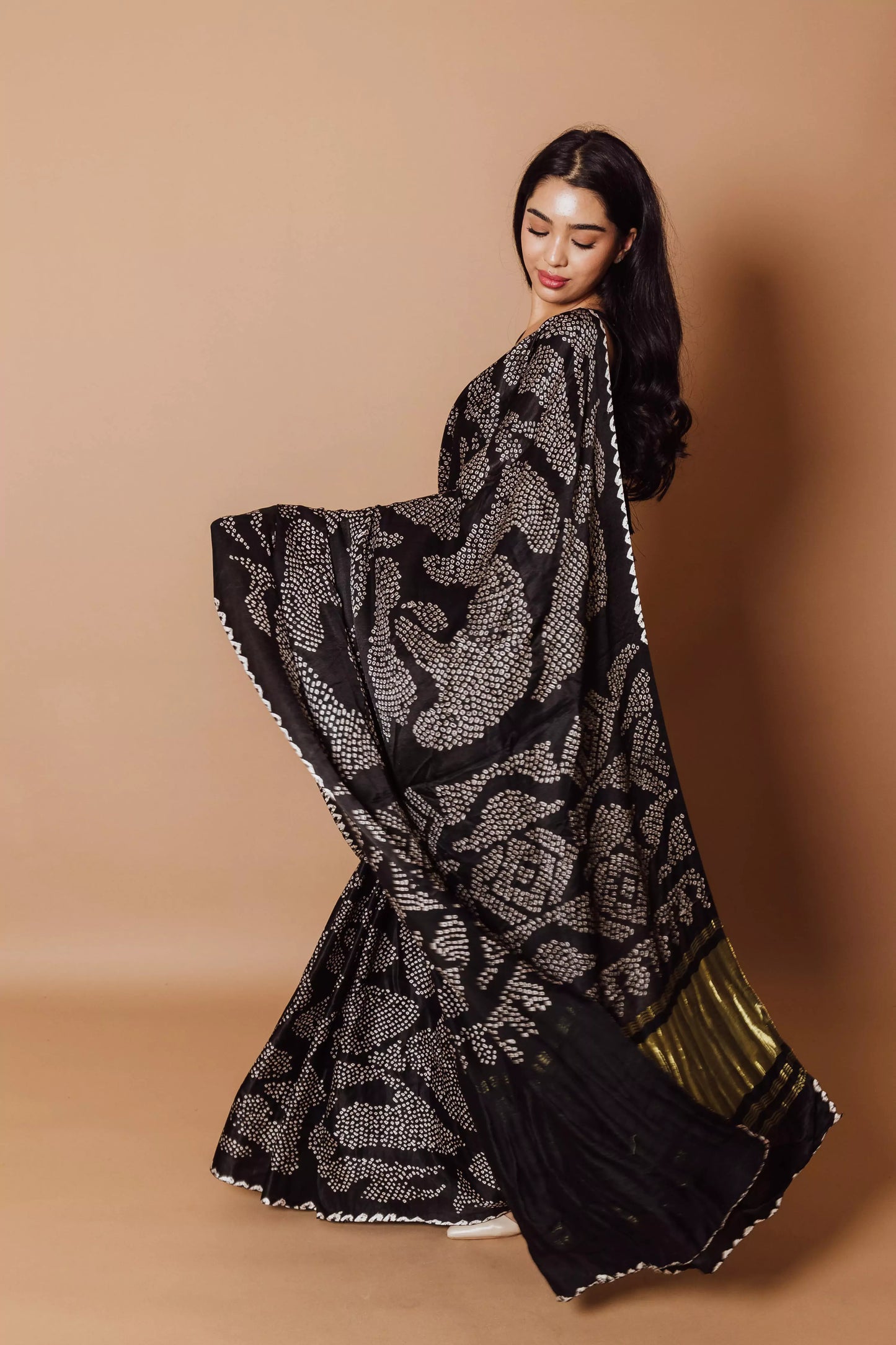 Karishma Black hand bandhej Saree