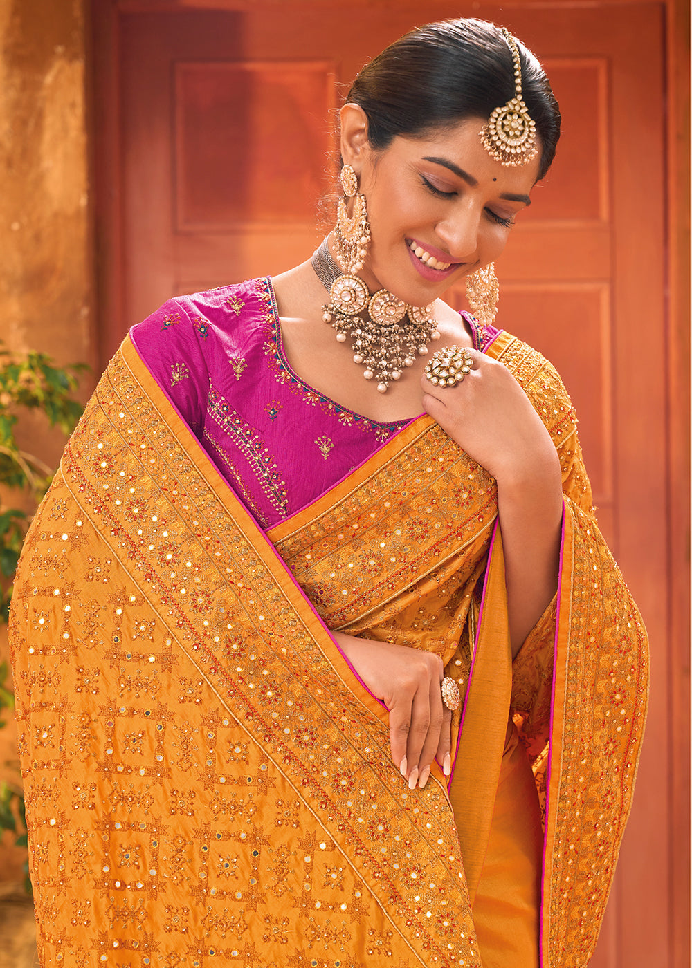 Apricot Orange Banarasi Silk Saree with Diamond,Mirror & Kachhi work