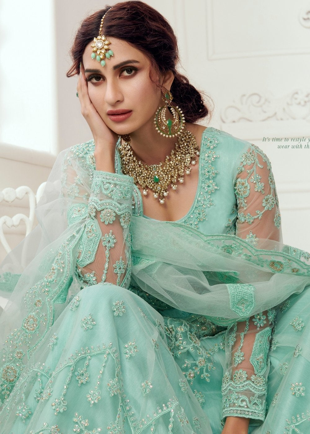 Turquoise Blue Soft Net Lehenga Choli with Cording, Stonework, Thread & Badla Embroidery