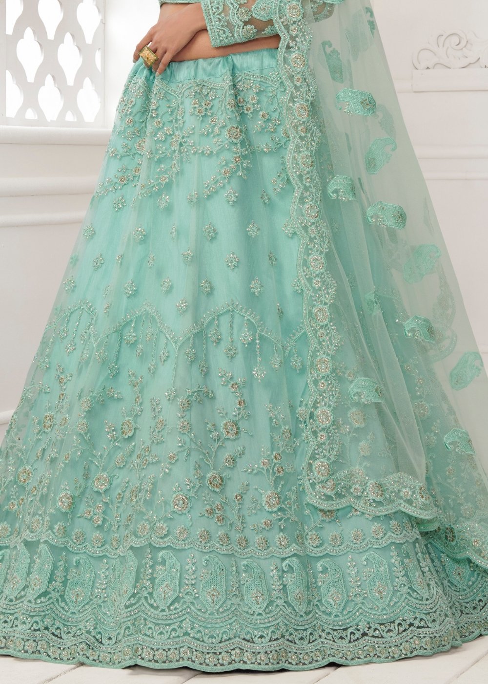 Turquoise Blue Soft Net Lehenga Choli with Cording, Stonework, Thread & Badla Embroidery