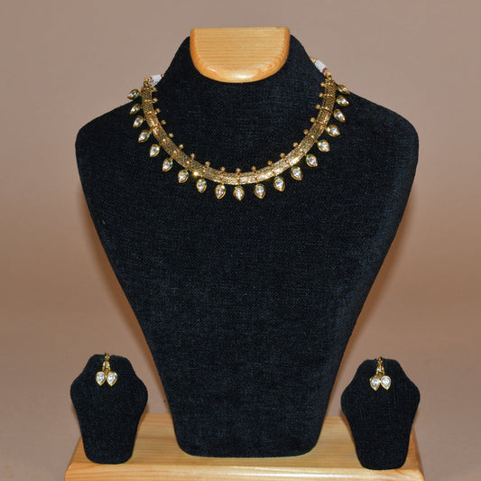 Golden Embellished Necklace with Complementing Earrings