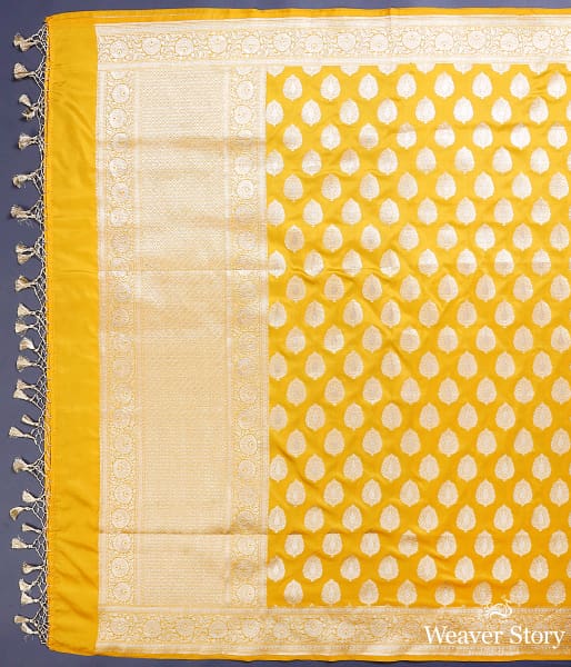 Yellow katan silk dupatta with leaf motifs and floral border