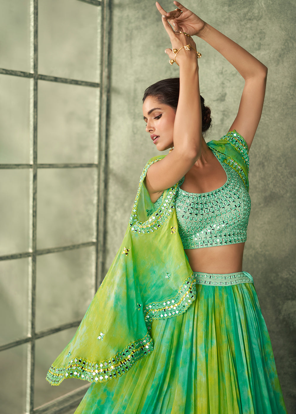 Shades Of Green Silk Embroidered Blouse with Tie Dye Georgette Skirt with Cutdana Embellished Waistline