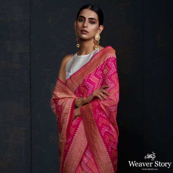 Pink Bandhej saree With Kadhwa booti and chevron tie and the