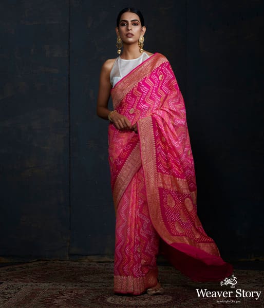Pink Bandhej saree With Kadhwa booti and chevron tie and the