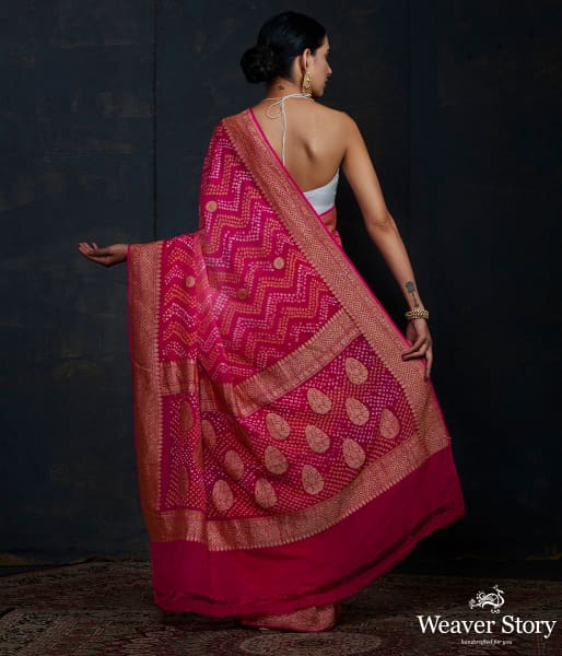Pink Bandhej saree With Kadhwa booti and chevron tie and the