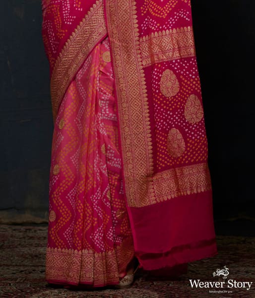 Pink Bandhej saree With Kadhwa booti and chevron tie and the