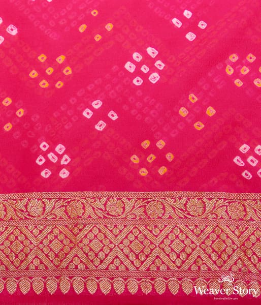 Pink Bandhej saree With Kadhwa booti and chevron tie and the