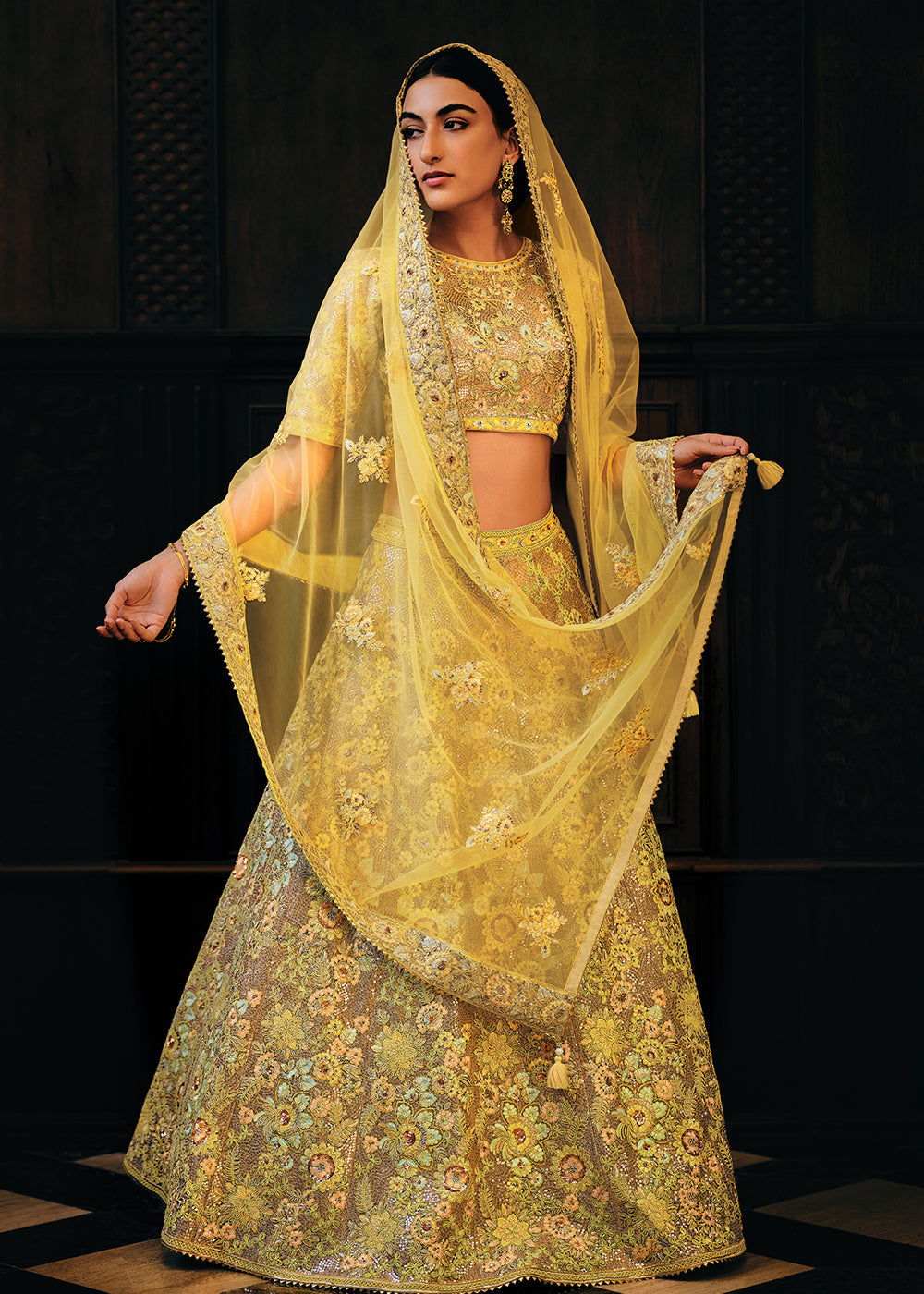 Shades Of Yellow Heavy Embroidered Net Lehenga Choli