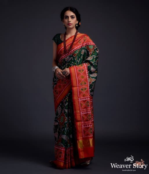 Pure silk Gujarat Patola saree in Green with red combination and large fish motifs