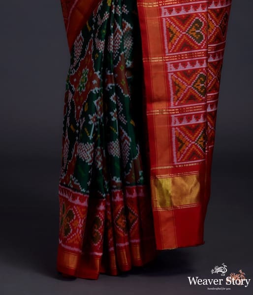 Pure silk Gujarat Patola saree in Green with red combination and large fish motifs