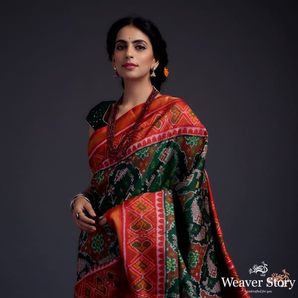 Pure silk Gujarat Patola saree in Green with red combination and large fish motifs