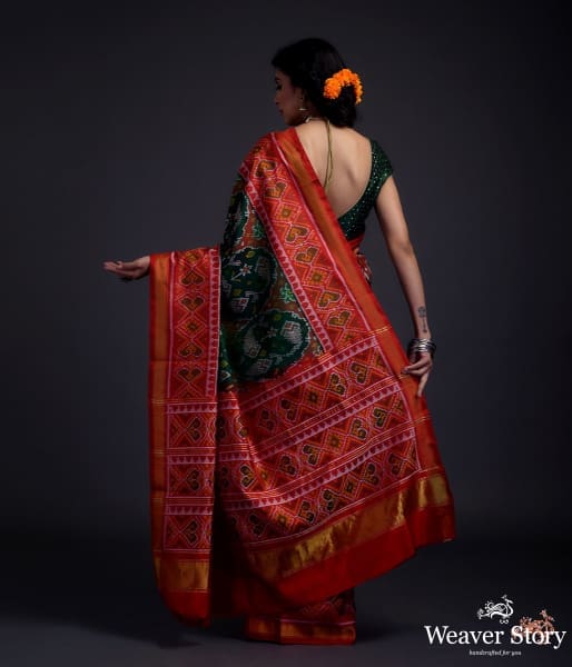 Pure silk Gujarat Patola saree in Green with red combination and large fish motifs