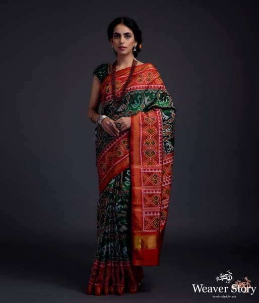 Pure silk Gujarat Patola saree in emerald green and red with horse, swan and fish motifs