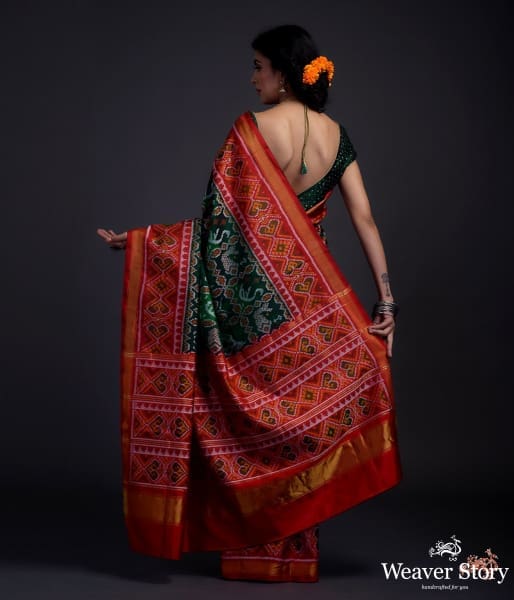 Pure silk Gujarat Patola saree in emerald green and red with horse, swan and fish motifs