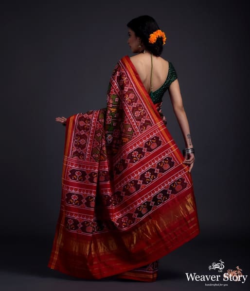 Pure silk Gujarat Patola saree in Green and red dual  and animal motifs woven diagonally