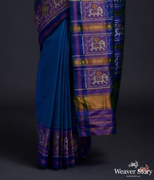 Turquoise Blue single ikat patola saree with tissue border