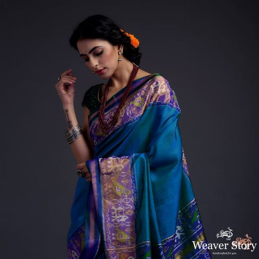 Turquoise Blue single ikat patola saree with tissue border