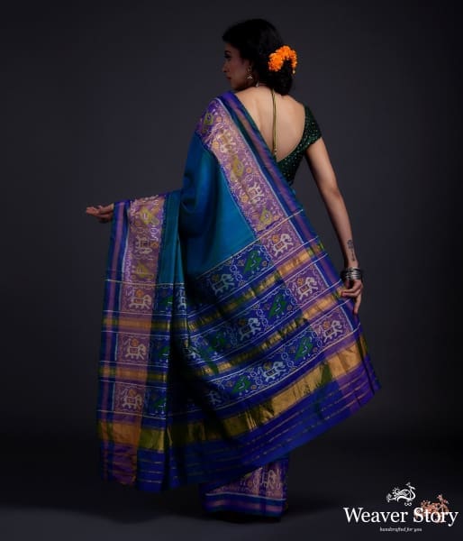 Turquoise Blue single ikat patola saree with tissue border