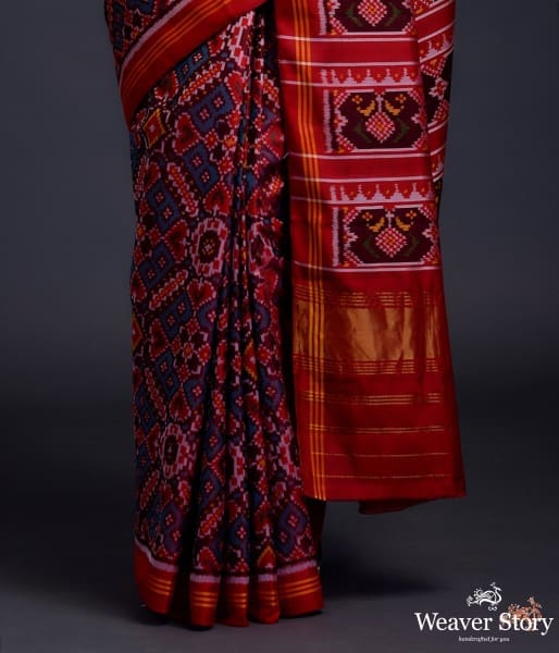 Pure silk Gujarat Patola saree in blue and red dual tone in the famous paan bhaat weave