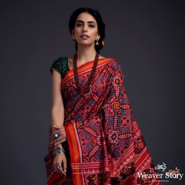 Pure silk Gujarat Patola saree in blue and red dual tone in the famous paan bhaat weave