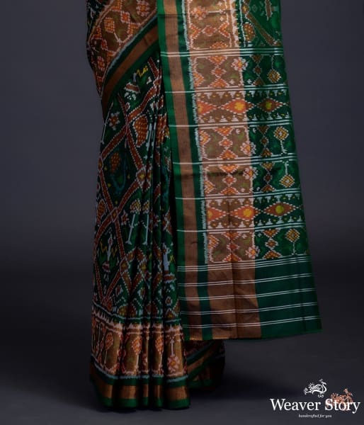 Emerald green single ikat patola saree with tissue border
