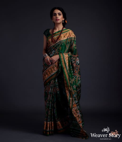 Emerald green single ikat patola saree with tissue border